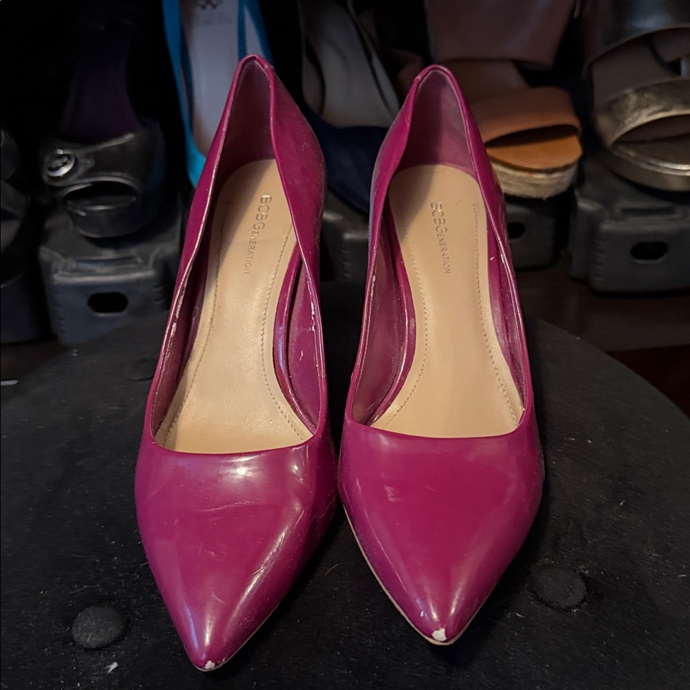 Burgundy Pointed toe heels. BCBG. Some wear on shoes
